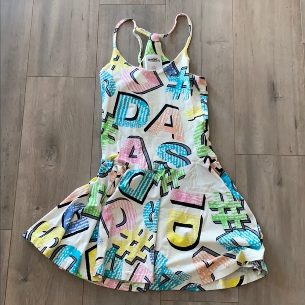 jeremy scott jersey dress One of Jeremy Scott's most iconic pieces from his own brand, the white leather batwing dress from his Spring 1998 collection, went up for auction this week and was estimated to fetch
